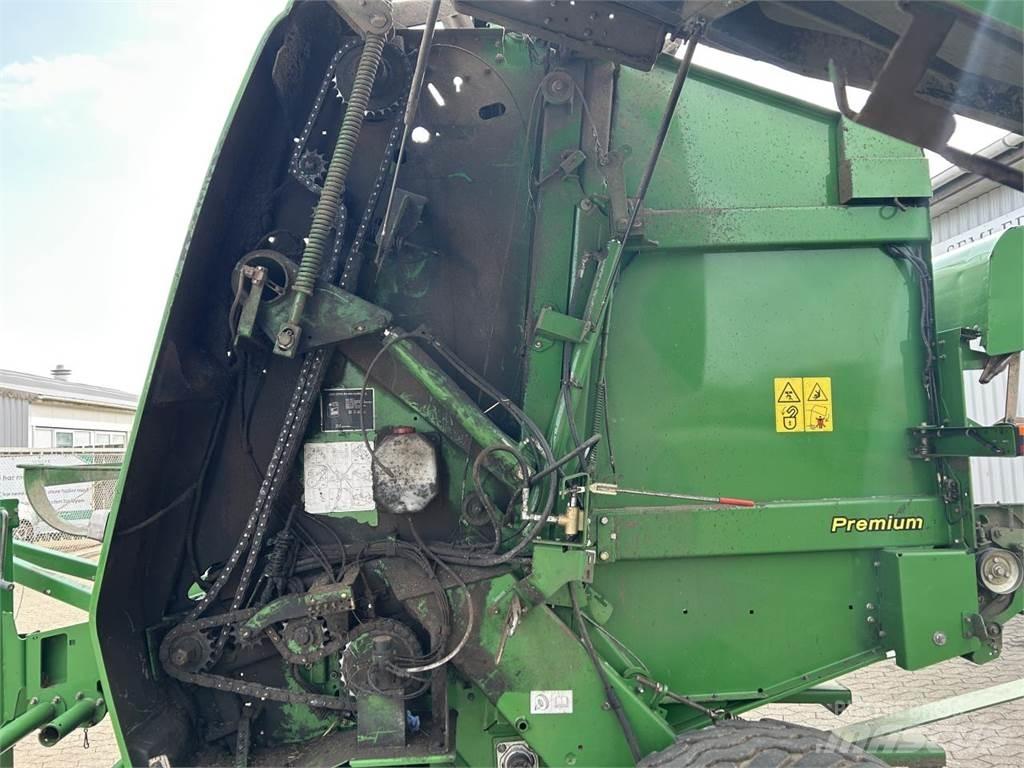 John Deere 864 원형 곤포기