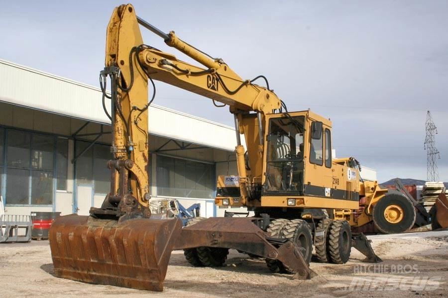 CAT 214B  휠 굴삭기