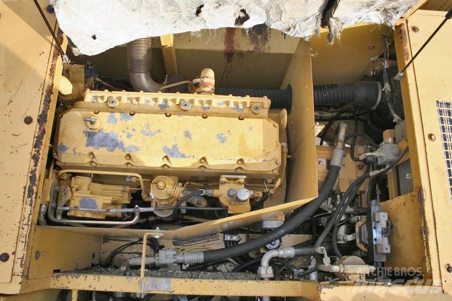 CAT 214B  휠 굴삭기
