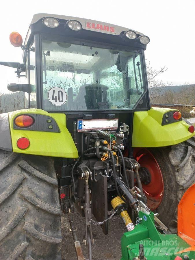 CLAAS Axos 330 CX 트랙터