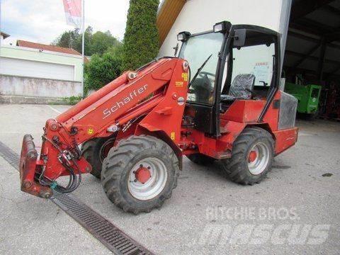 Schäffer 450T 프론트 로더 및 굴착기