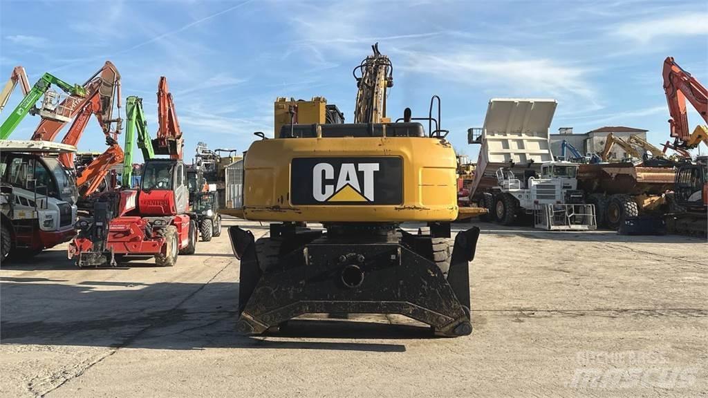 CAT M325D 4X4  휠 굴삭기