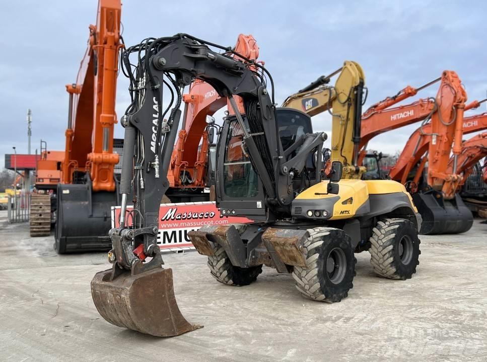 Mecalac 12 MTX  휠 굴삭기