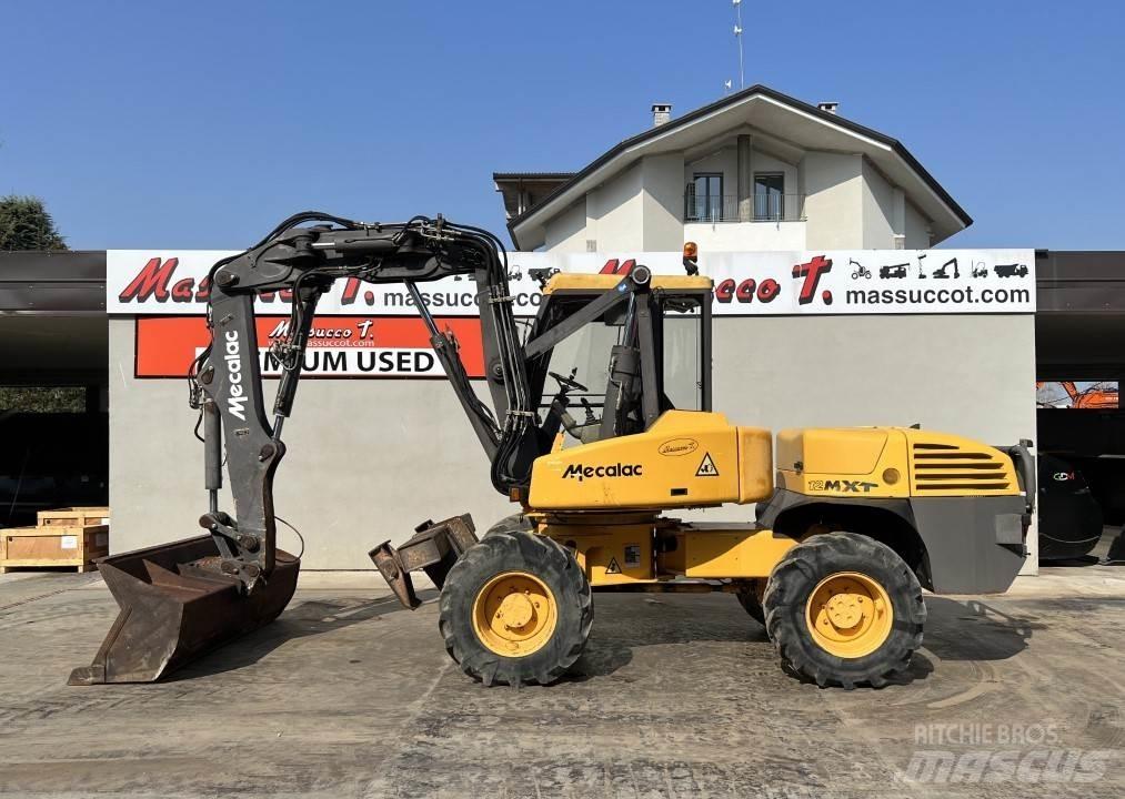 Mecalac 12MXT-E  휠 굴삭기
