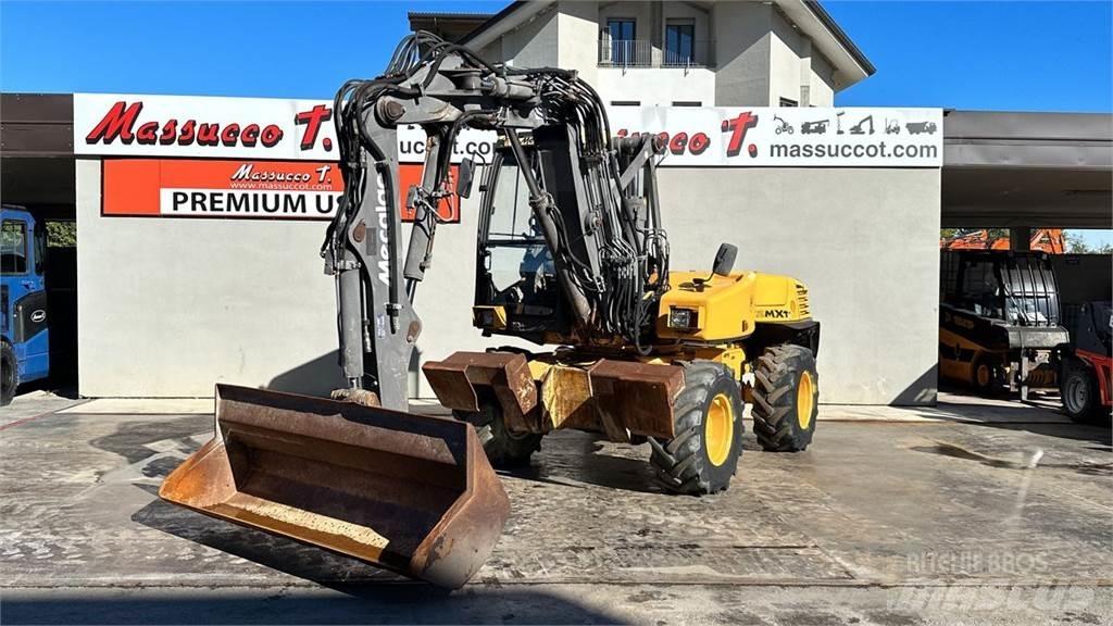 Mecalac 12MXT - E  휠 굴삭기