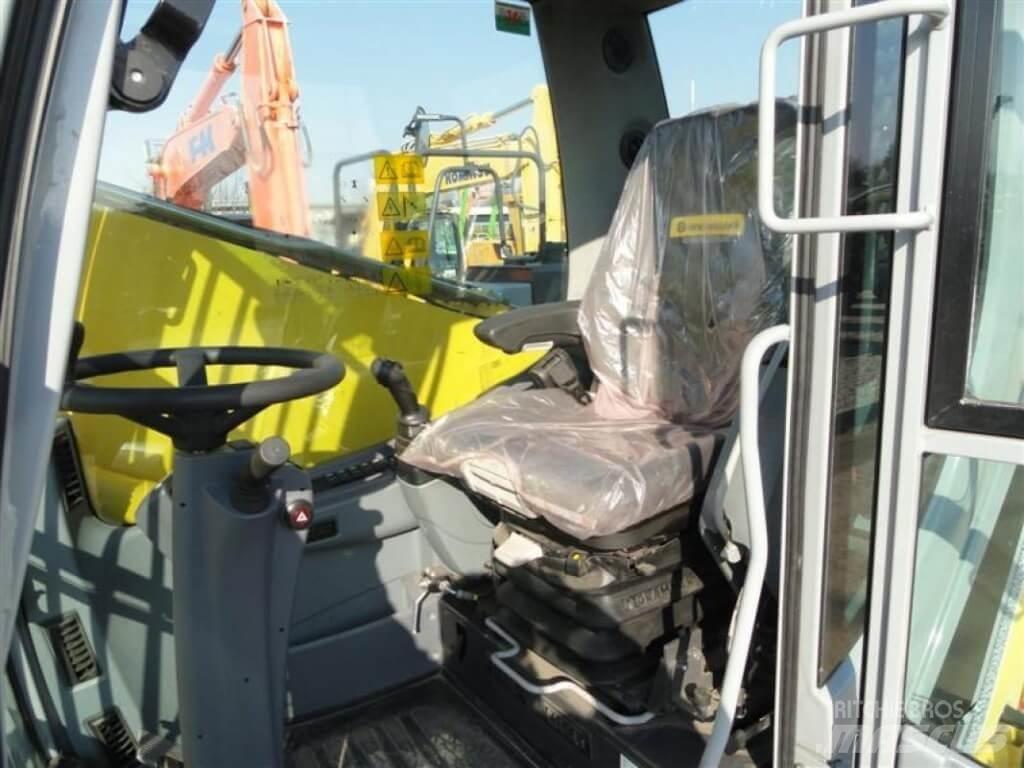 New Holland WE210  휠 굴삭기