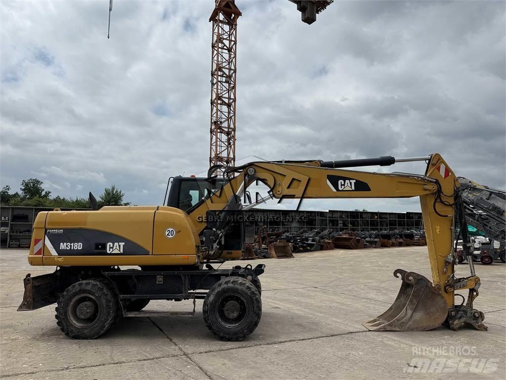 CAT M 318 D  휠 굴삭기