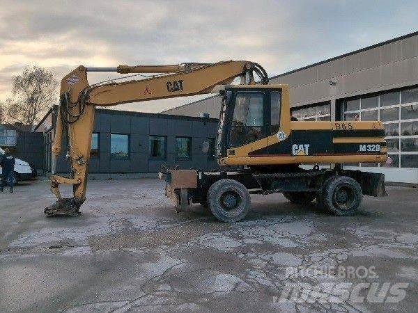 CAT M320  휠 굴삭기