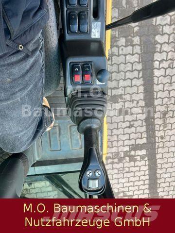 CAT MH 3022  휠 굴삭기