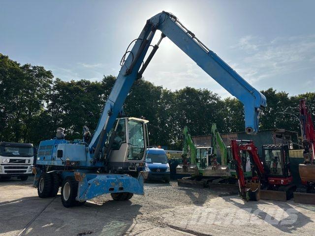 Fuchs MHL 320  휠 굴삭기