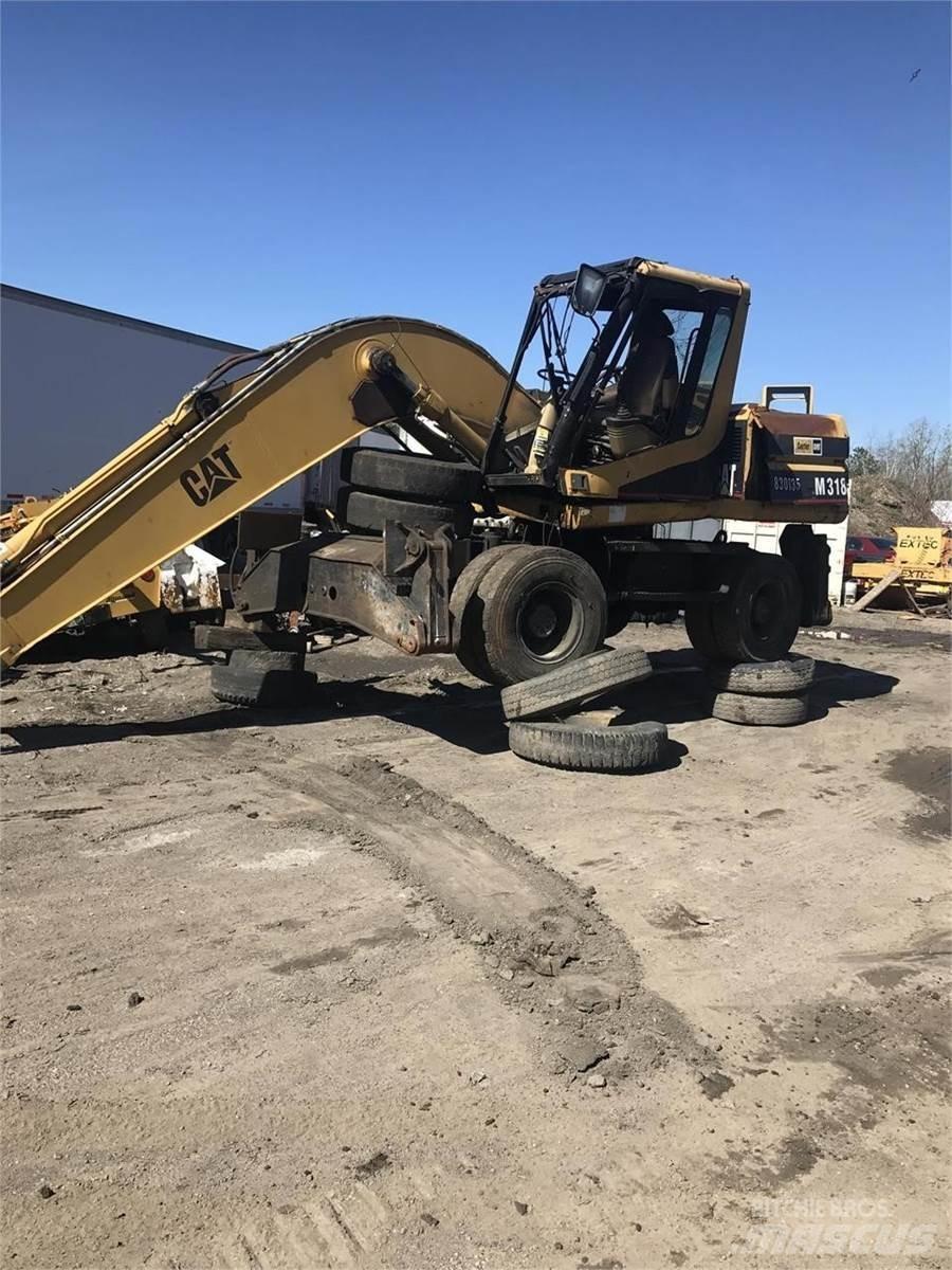 CAT M318  휠 굴삭기