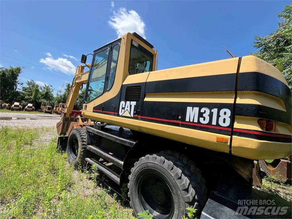 CAT M318  휠 굴삭기