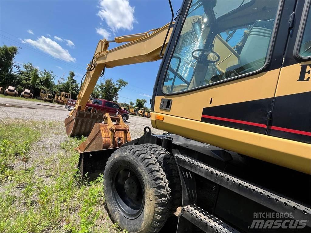 CAT M318  휠 굴삭기