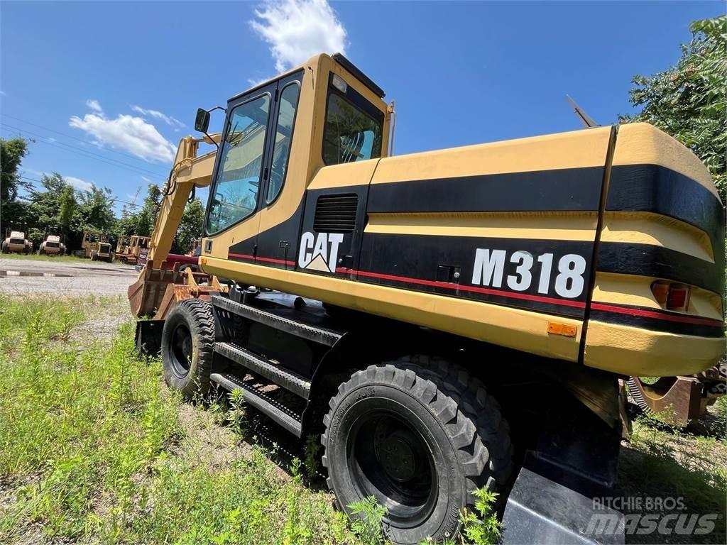 CAT M318  휠 굴삭기