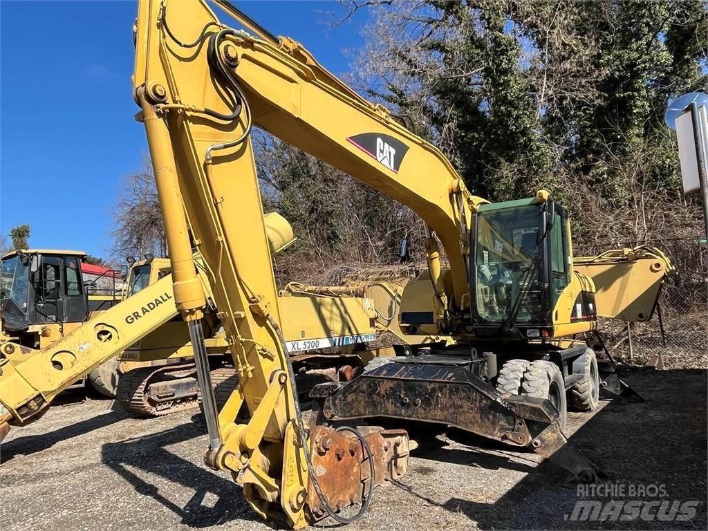 CAT M318C  휠 굴삭기