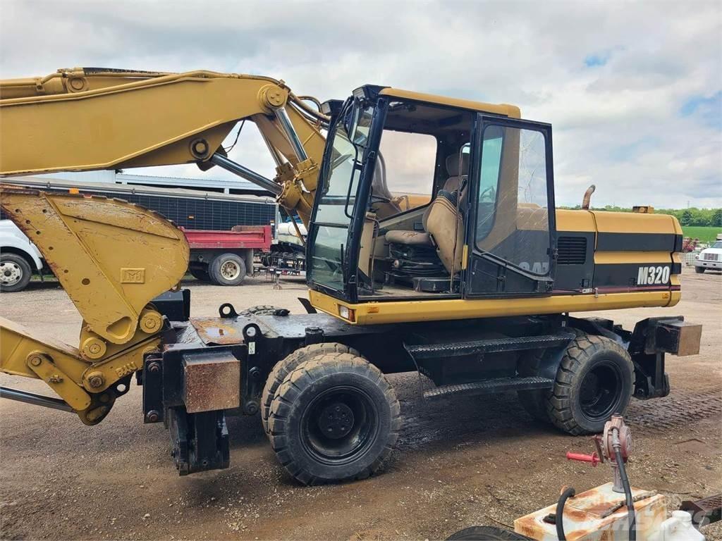 CAT M320  휠 굴삭기