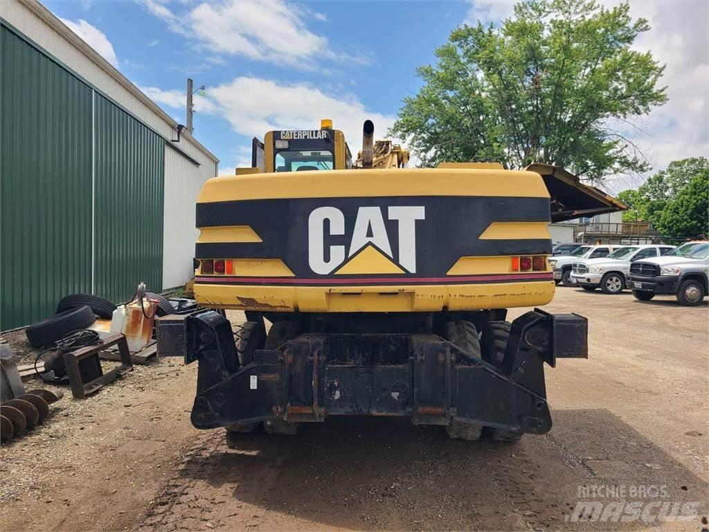 CAT M320  휠 굴삭기