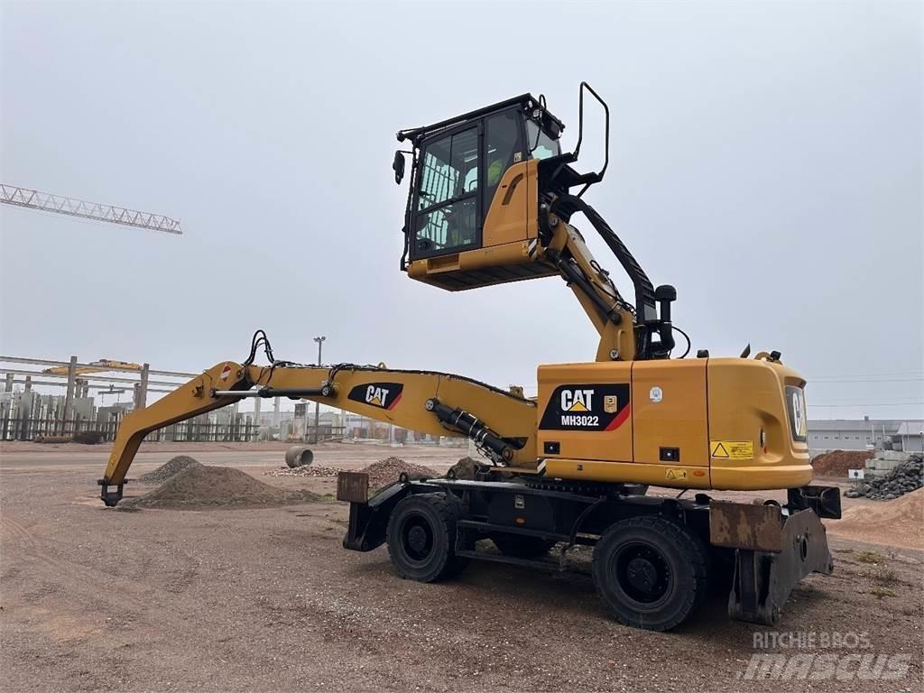 CAT MH3022  휠 굴삭기