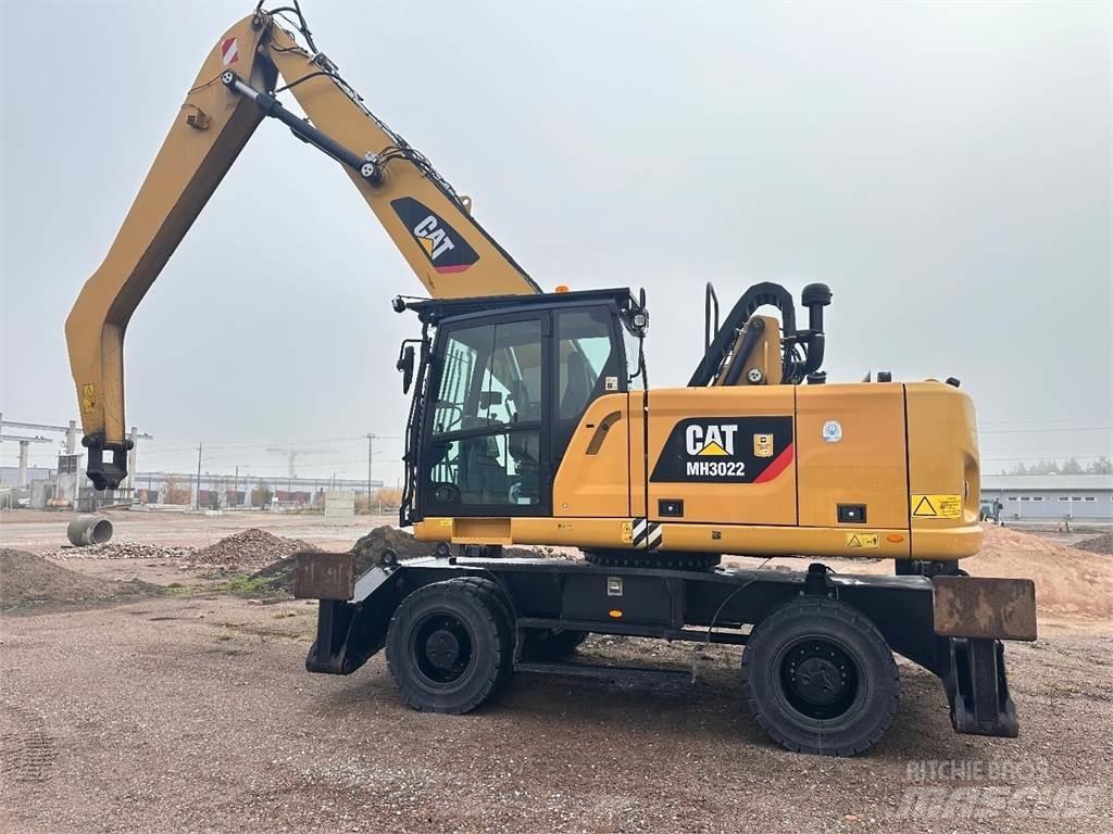 CAT MH3022  휠 굴삭기