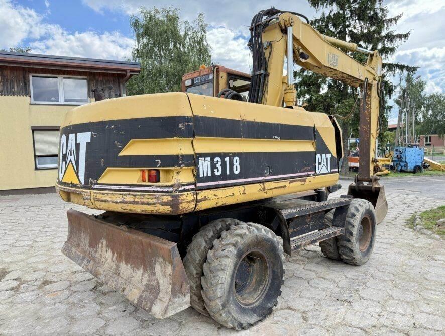 CAT M318  휠 굴삭기