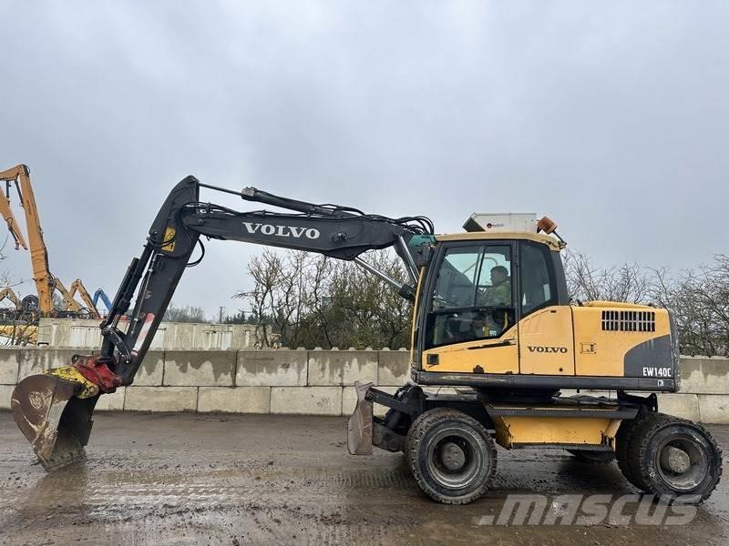 Volvo EW140  휠 굴삭기