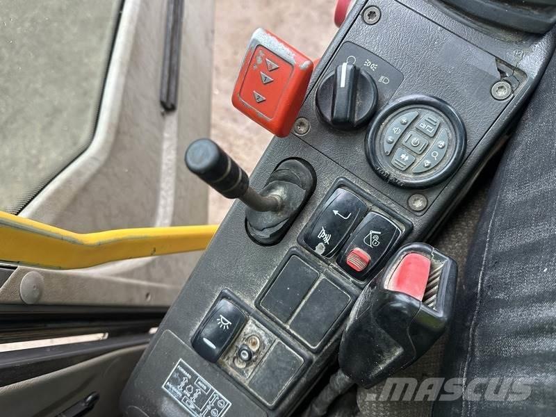 Volvo EW140  휠 굴삭기