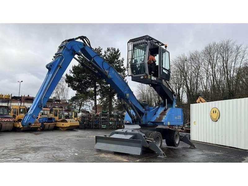 Fuchs MHL320 폐기물/산업 처리기