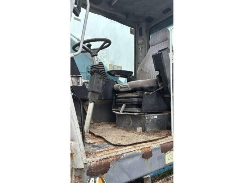 Fuchs MHL320 폐기물/산업 처리기