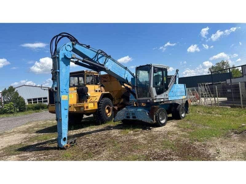 Fuchs MHL320 폐기물/산업 처리기
