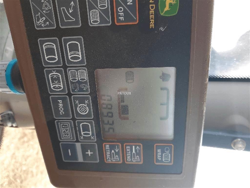 John Deere 864 원형 곤포기